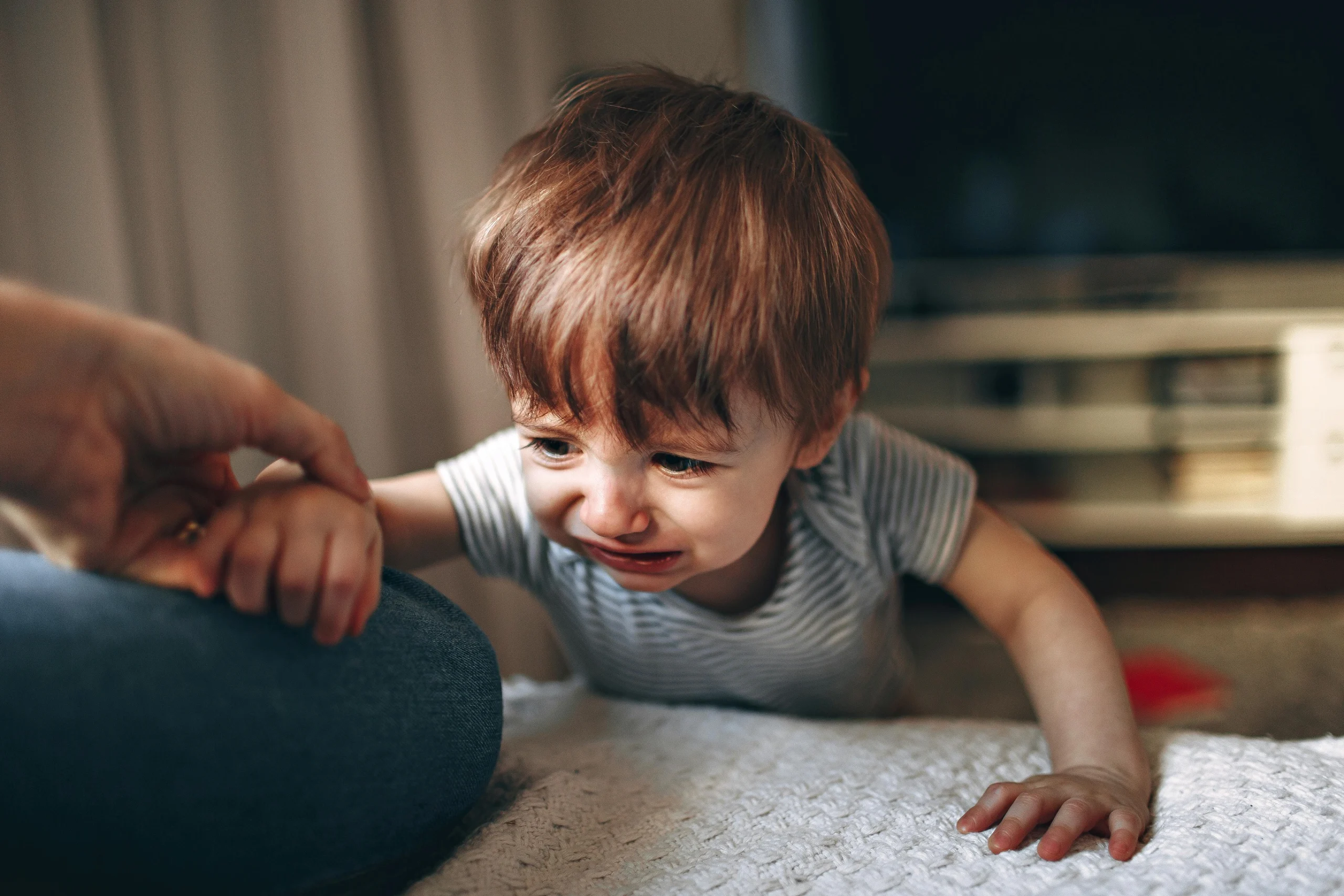7 Proven Ways to Stop Your Toddler From Climbing Out of the Crib (Expert-Approved)