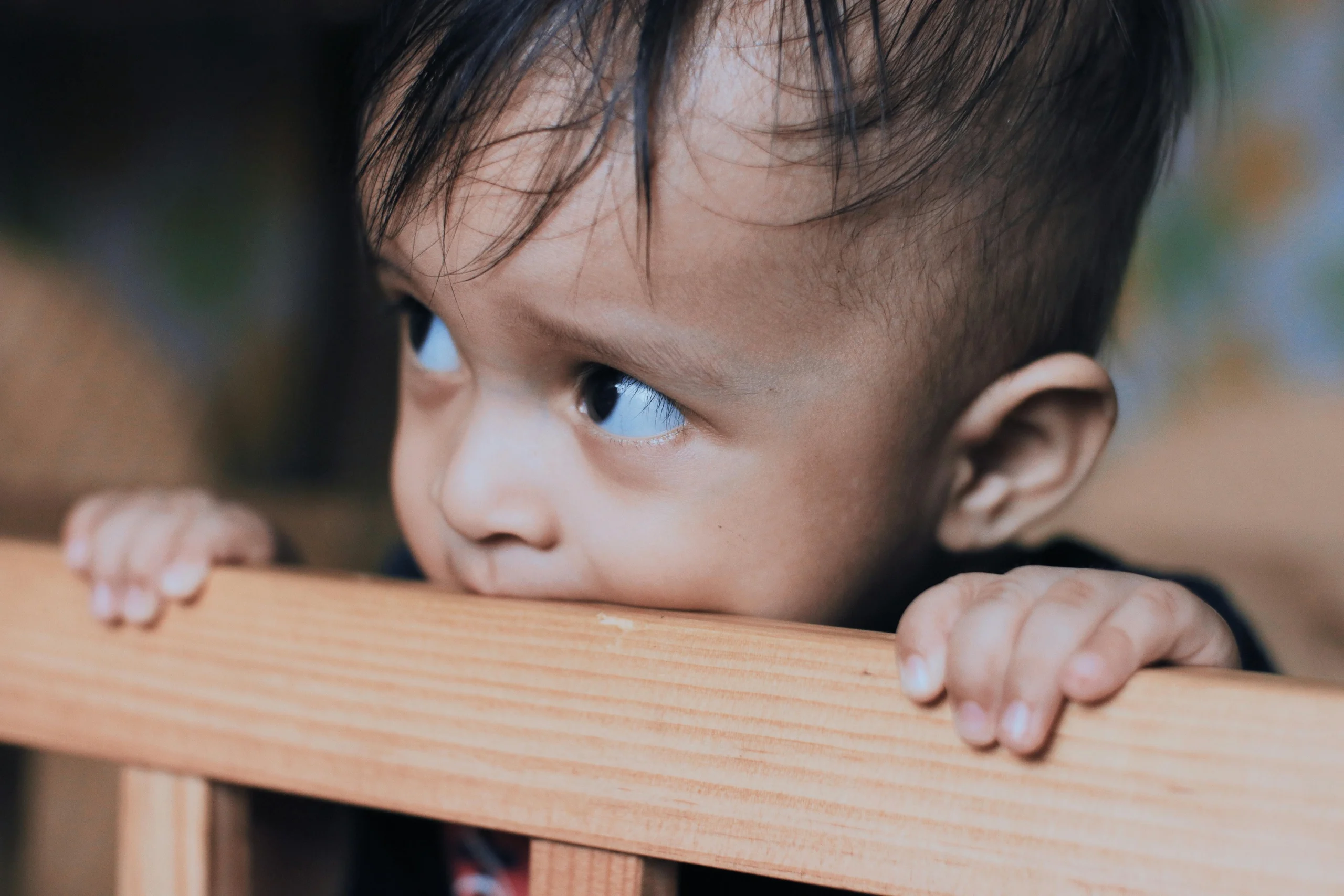 7 Proven Ways to Stop Your Toddler From Climbing Out of the Crib (Expert-Approved)