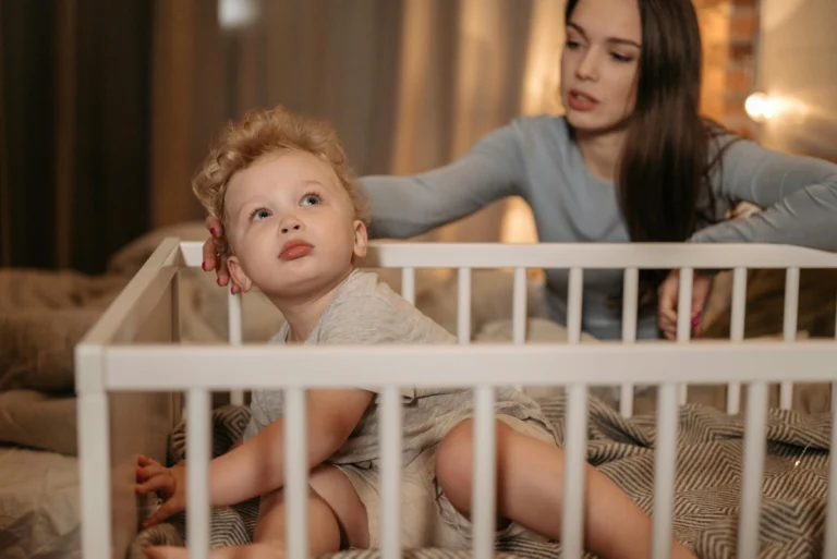 7 Proven Ways to Stop Your Toddler From Climbing Out of the Crib (Expert-Approved)